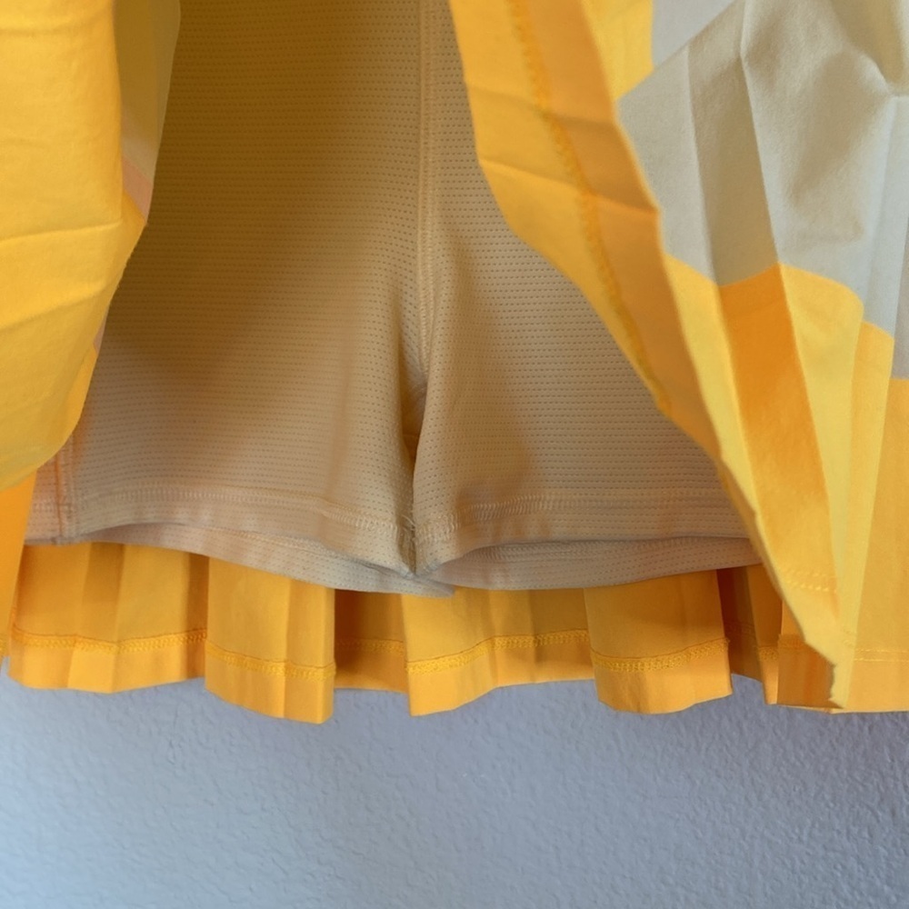 Athleta girl pleated tennis skirt kids XXL 16 orange yellow EUC skort - Picture 3 of 4